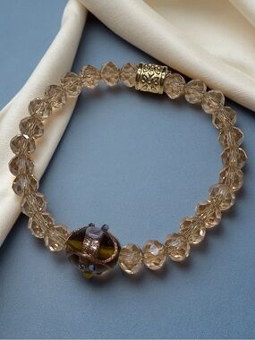 Gold-Tone Champagne Beaded Stretch Bracelet with Decorative Focal Bead